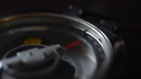 Close-up man's hand using old fashioned compass. north sign in the compass. Stock Footage 220713845