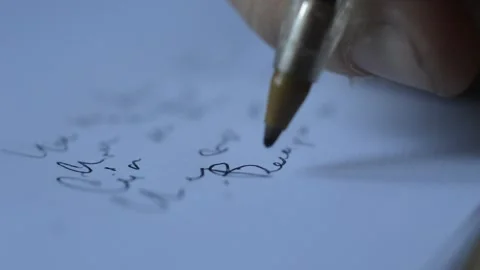 Close-up man's hand using pen for writing on paper. writing on paper Video stock 203881457