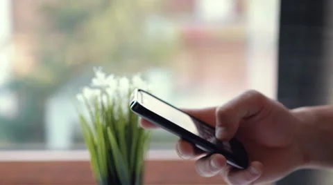 Close up of man's hand using smart phone Stock Footage 63369232