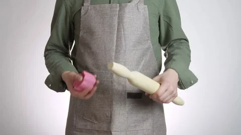 Close-up of a man's hands in an apron showing kitchen equipment Vídeo Stock 311889602