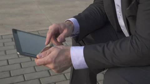 Close up on man's hands, browsing tablet. 動画素材 52755330