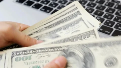 Close-up of man's hands counting dollar money. budget allocation of money. Stock Footage 266470326