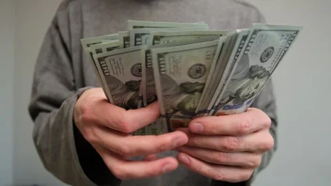 Close up, man's hands counting money, american dollars bills. Time-lapse. A man Stock Footage 303900746