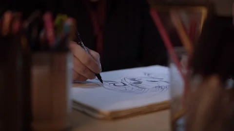 Close-up of a man's hands drawing. Artist creating in the studio. Stock Footage 152344841