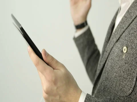 Close up. Man's hands hold the tablet. Stock Footage 73777059