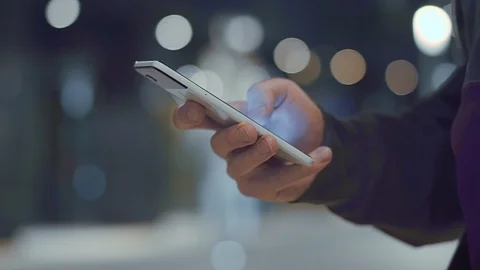 Close up of man's hands holding cell phone Stock Footage 94370243