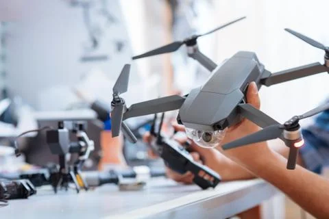 Close up of mans hands holding drone propeller Stock Photos