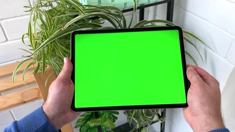 Close up Mans hands Holding Tablet Computer with Green Screen Stock Footage 255772903