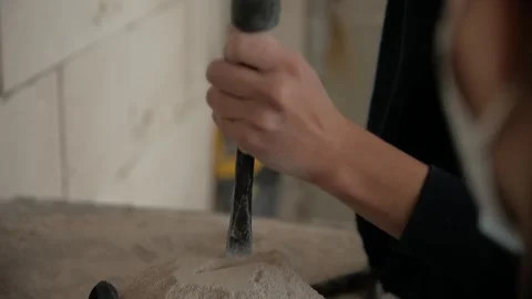 Close-up of man's hands making a stone sculpture in a workshop. Stock Footage 272154858
