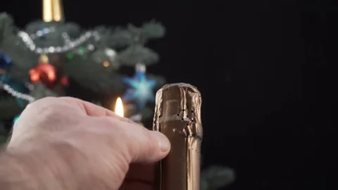 Close up of man's hands opening a bottle of champagne. Stock-Footage 82282007