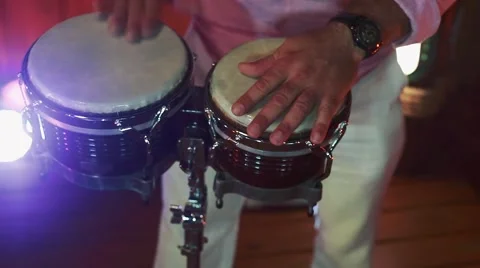 Close-up of man's hands playing congas Stock Footage 63055679