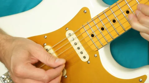 Close up of man's hands playing electric guitar Stock Footage 35511171