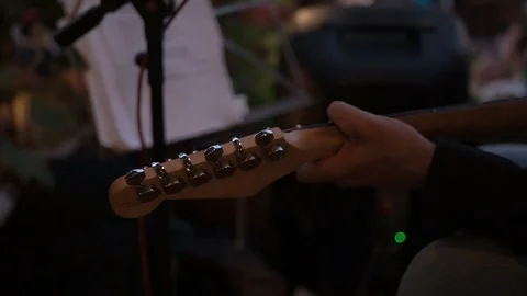 Close-up of a man's hands playing a guitar Stock Footage 96766273