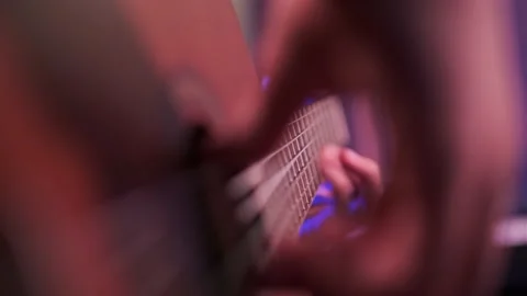 Close-up of a man's hands playing the guitar. The musician plays an acoustic  스톡 동영상 144171167