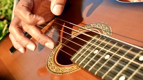 Close-up of a man's hands playing the guitar. Stock Footage 164603810