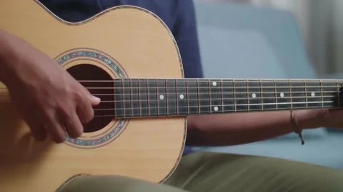 Close Up Of Man'S Hands Playing A Guitar At Home Stock Footage 200834577