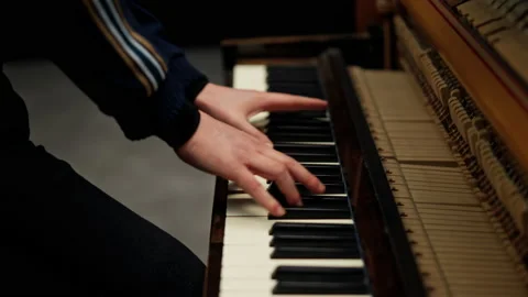 Close-up Of A Man's Hands Playing The Piano Video stock 236512774