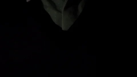 Close up of man's hands praying with dark background Stock Footage 121233119