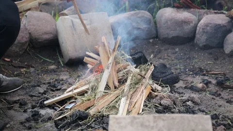 Close up on Man's hands preparing bonfire. 스톡 동영상 117408344