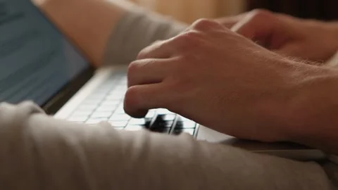 Close-up of a man's hands pressing the keys of a laptop. Stock Footage 279590714