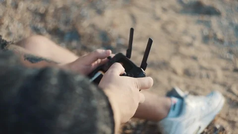 Close up man's hands with remote controller drone. Stock Footage 113632407