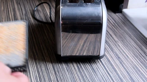 Close of a man's hands sliding out a full tray of 動画素材 243837985