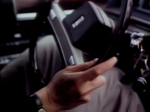 Close-up of man's hands on steering wheel while driving car Stock Footage 90728081