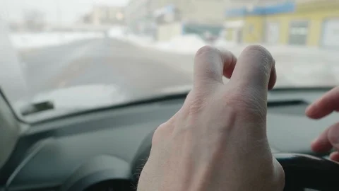 Close up of man's hands on steering wheel. Positions of fingers is changing Stock Footage 123272602