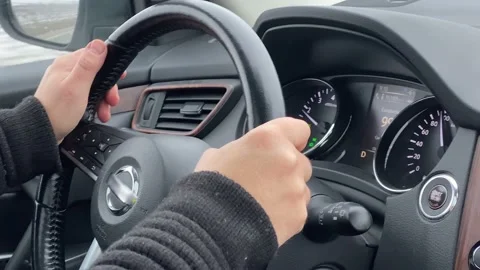 Close-up of a man's hands on the steering wheel Stock Footage 230027841