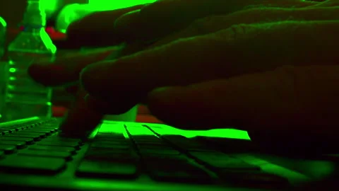 Close-up of a man's hands typing fast on a laptop keyboard Stock Footage 336245804