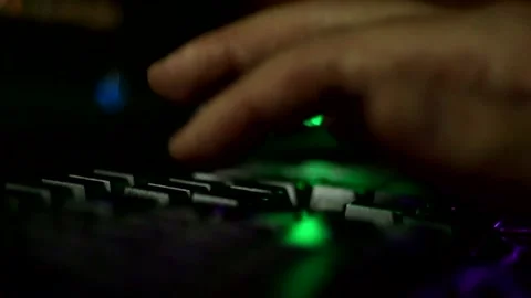 Close-up of a man's hands typing on a keyboard 库存影片 333707034