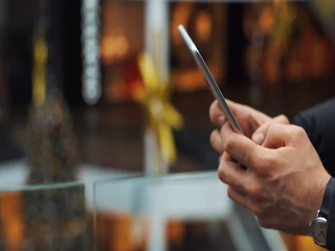 Close-up of man's hands typing something on the tablet Stock Footage 85052674