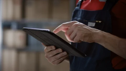 Close-up on a Man's Hands Using Digital Tablet Computer while Standing Video stock 96143606