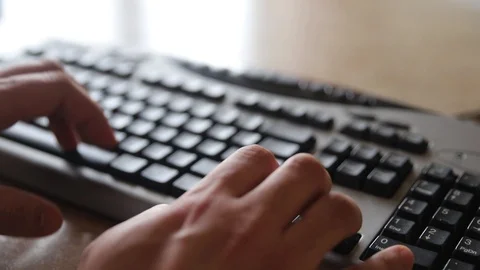 Close-up of man's hands using a gaming keyboard Stock Footage 123531101