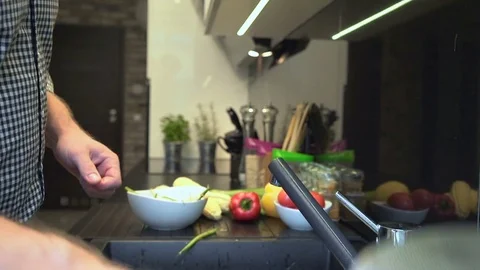 Close up on man's hands washing string-beans. Slider shot. Video stock 70575795