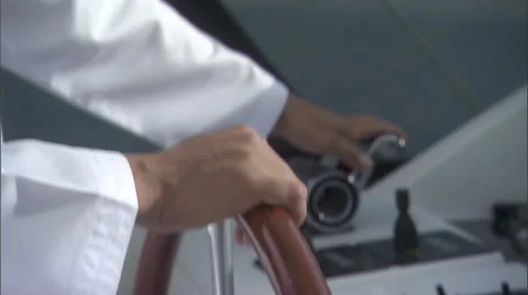 Close up of a man's hands while he is steering a boat. Stock Footage 46866278