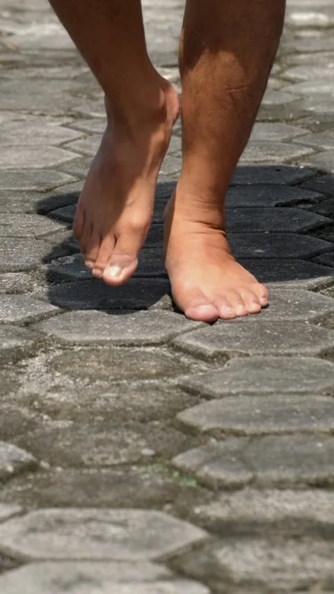 Close-up of a man's legs spot jogging in the yard Stock-Footage 336589799