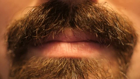 Close up of man's mouth with beard. Stock Footage 122079992