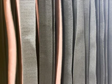 Close-up of Many Black Nylon Webbing Straps and Belts Background Stock Photos