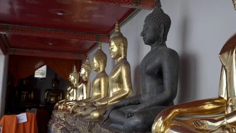 Close up of many buddhist gold statue Stock Footage 75535570