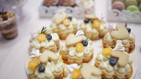 Close-up many cakes handmade on the buffet table. Stock Footage 129706420