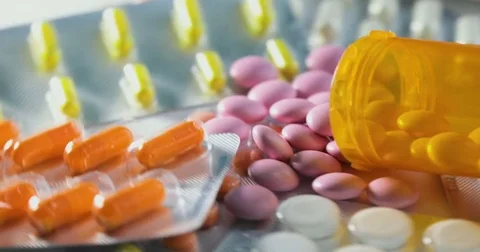 Close up of many different spinning Pills and drugs. Medicine, pills and tablets Stock Footage 78545545