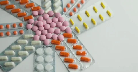 Close up of many different spinning Pills and drugs. Medicine, pills and tablets Stock Footage 78547381