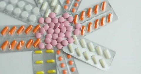 Close up of many different spinning Pills and drugs. Medicine, pills and tablets Stock Footage 78548333