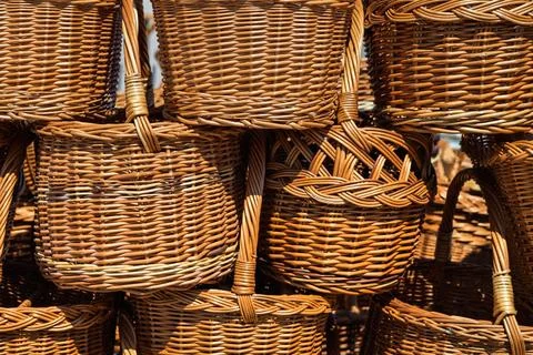 Close up of many handmade wicker baskets stacked together at a traditional Stock Photos