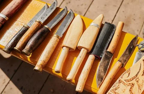 Close up of many kinds of different rustic vintage knifes long time ago for 写真素材
