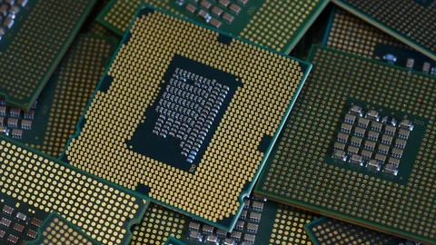 Close Up on many old Computer CPU Chip on rotating. Selective focusing. Stock Footage 127585723