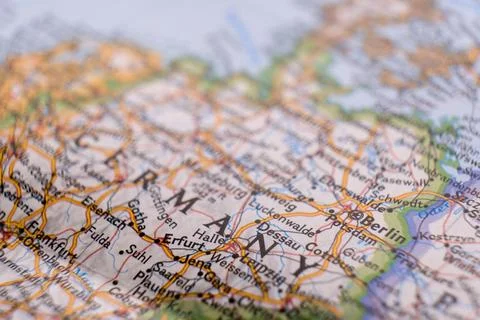 Close up of map highlighting Berlin, Germany through selective focus, shallow Stock Photos