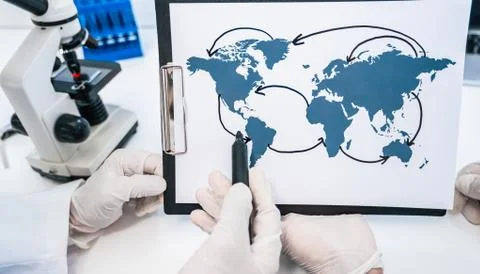 Close up. map of the spread of coronavirus in the hands of an epidemiologist Stock Photos