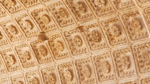 Close up of marble ceiling with carved flower pattern in Rome. Camera moving Stock Footage 125755022